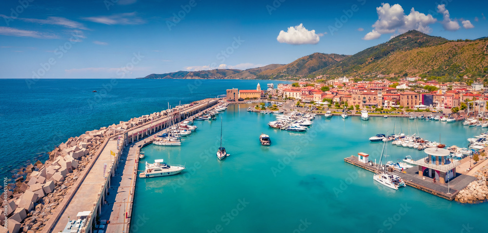Panoramic summer view from flying drone of Acciaroli port. Wonderful outdoor scene of Mediterranean coast of Italy. Traveling concept background.