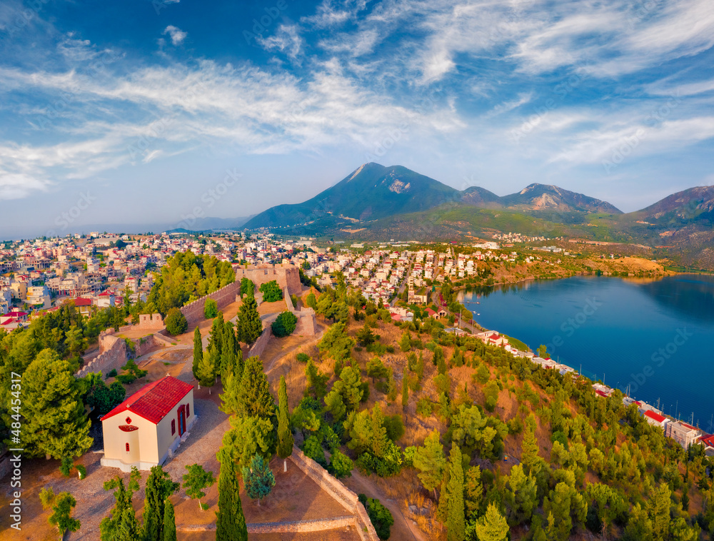 Gorgeous summer view of Karababa Castle. Spectacular cityscape of Chalcis town, Greece, Europe. Adorable  sunrise on Euboea island, Greece, Europe. Traveling concept background.
