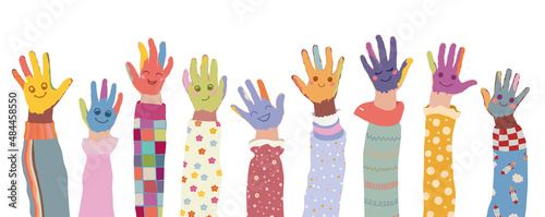 Group of painted hands of joyful happy multicultural kids and baby girls and boys.Colorful kids hands with smile.Preschool - kindergarten of children different cultures coloring together