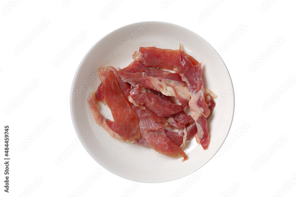 pork meat strip in white plate on white background pork meat strip in white plate on white background