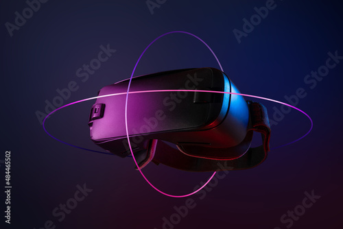 Metaverse. Future game and entertainment digital technology. VR virtual reality glasses isolated on dark background. photo