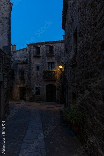 stone street in the medieval village of pals at night © larrui