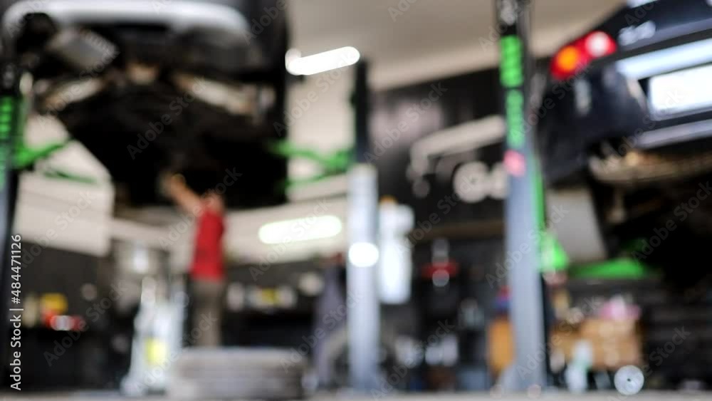 blurred background of workflow in car service. car repair background video blurred background of workflow in car service. car repair background video