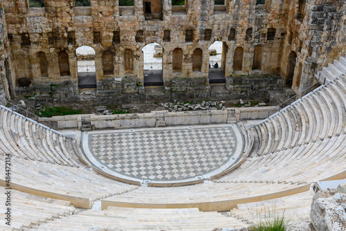 Looking down at the marble floor and colonnades of the Odeon of Herodes Atticus, one of the Classical Greek structures at the Acropolis in Athens, Greece. photo