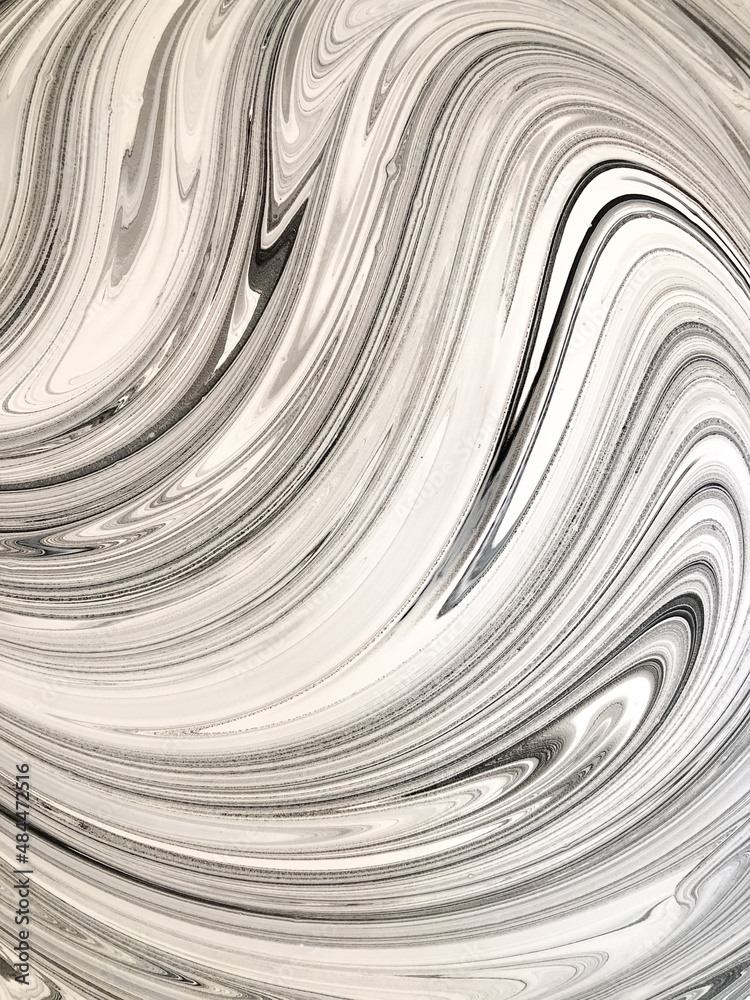 Black and white abstraction with liquid acrylic paint. Smooth lines and stains. . High quality photo Black and white abstraction with liquid acrylic paint. Smooth lines and stains. . High quality photo