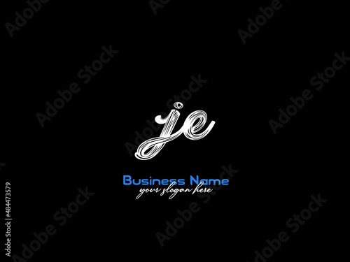 Classic Brush JE Logo, Simple Luxury Je Signature Letter logo Vector photo