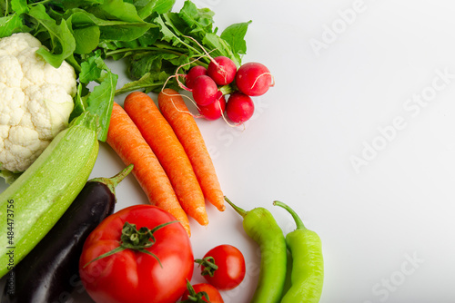 Isolated group of winter season vegetables over white flat lay view. Includes copy space.