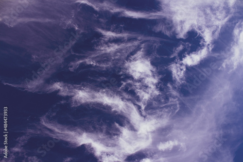 small white clouds on blue sky background 