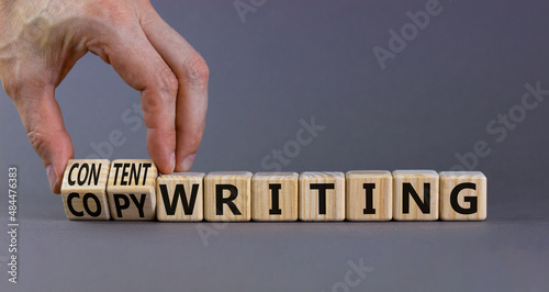 Content writing or copywriting symbol. Businessman turns cubes changes words content writing to copywriting. Beautiful grey background copy space. Business Content writing or copywriting concept. photo