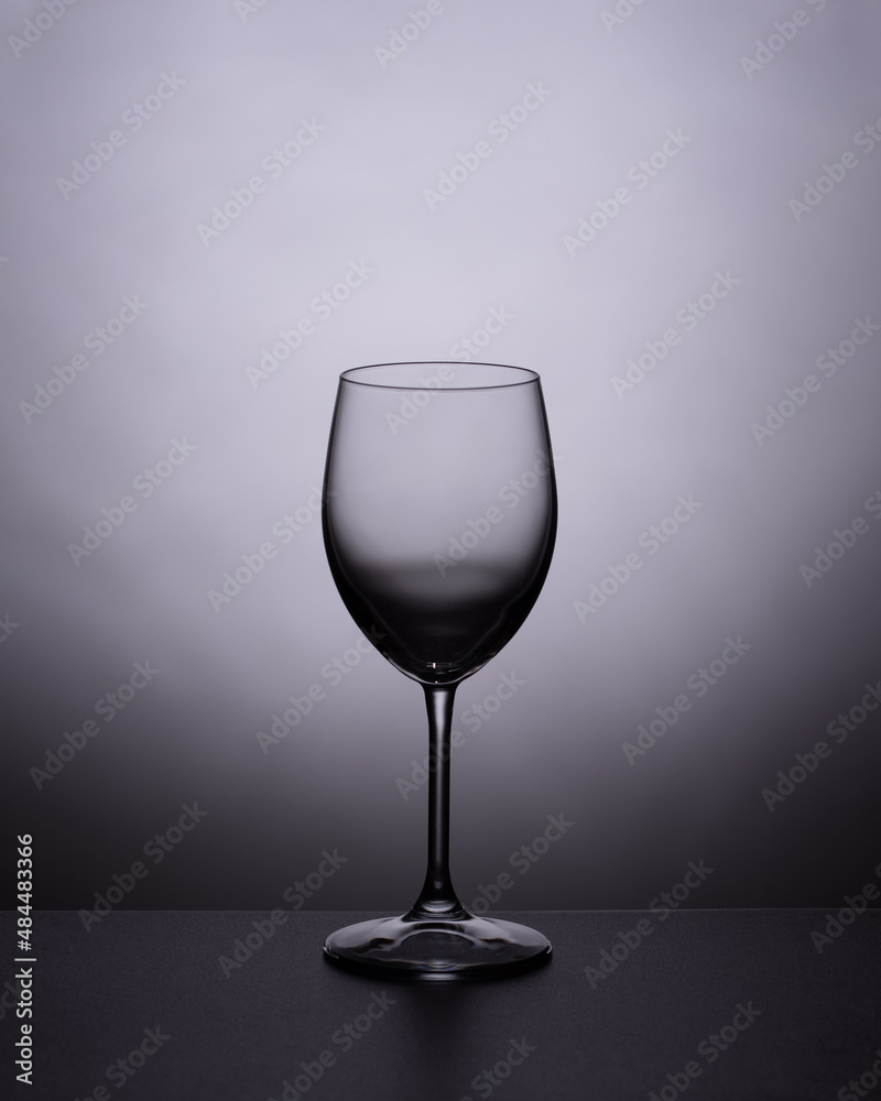 A glass vessel, empty glass, Wine glass with a gray gradient rim A glass vessel, empty glass, Wine glass with a gray gradient rim