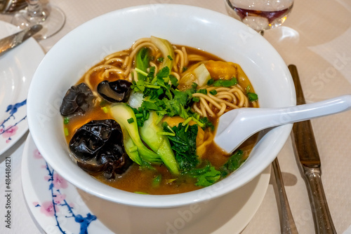 Chinese Noodle Soup with Black Algaes and vegetables, special homemade Soup. High quality photo photo