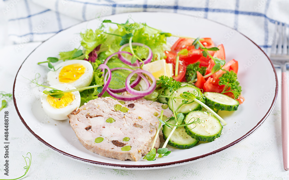 Ketogenic diet. Boiled egg, meatloaf and fresh salad. Keto breakfast. Brunch. Ketogenic diet. Boiled egg, meatloaf and fresh salad. Keto breakfast. Brunch.