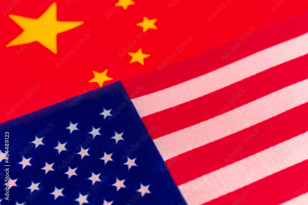 Fototapeta premium USA vs China conflict concept. Flags of United States of America and China. Economy and politics photo