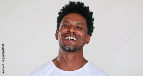 African American laughing and smiling out loud portrait face, emotional reaction laugh