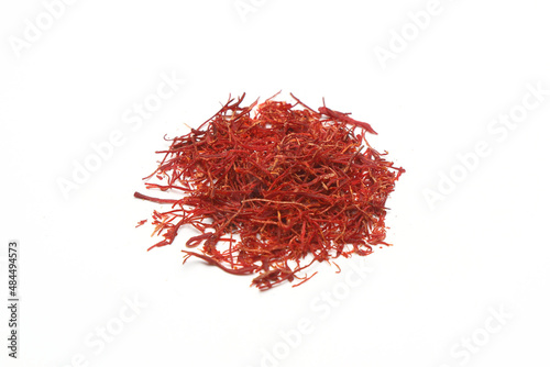 stigmas of saffron isolated on white background. dried spice saffron threads Crocus