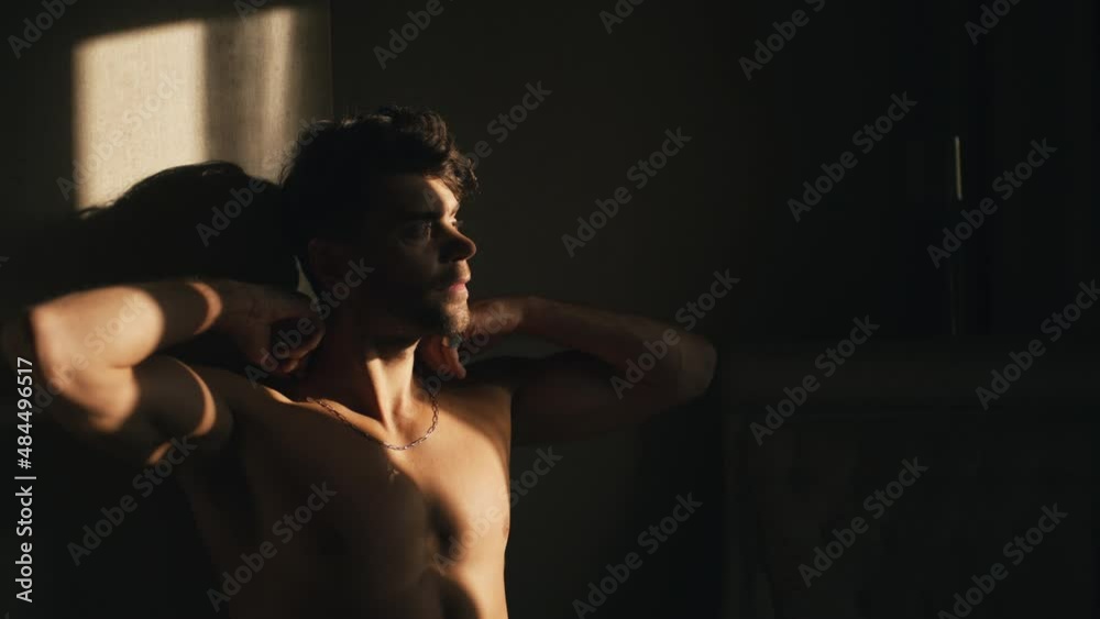 stylish brunette man with naked torso