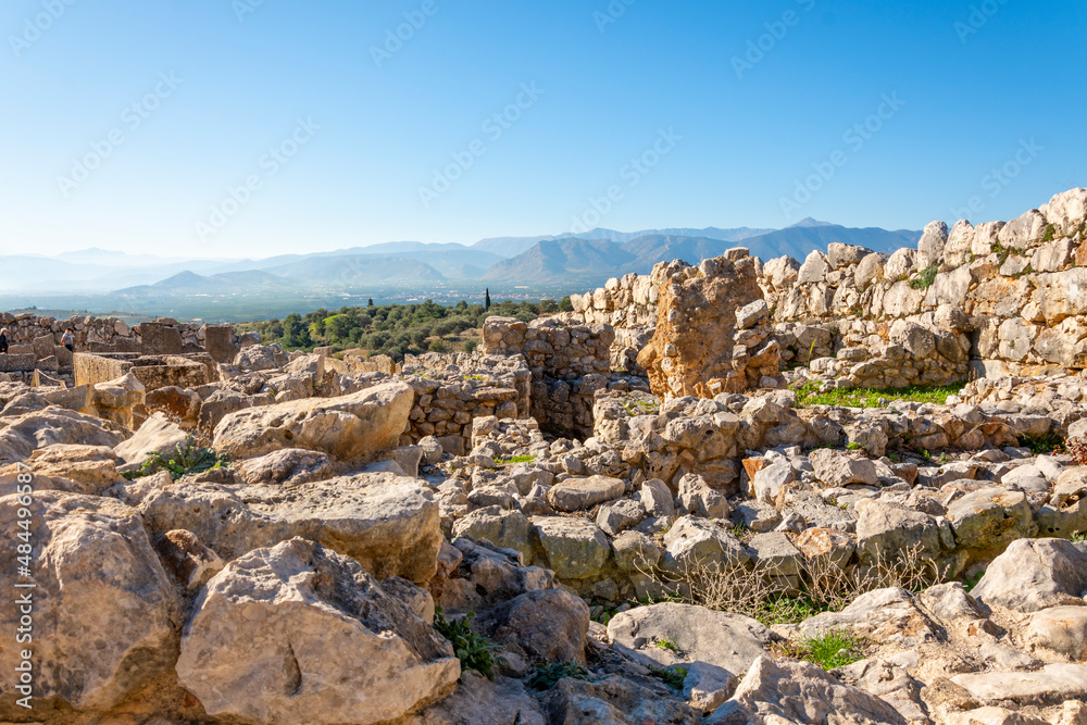 Ancient Greek ruins overlooking the valleys and hills of the Peloponnese at the archaeological site of Mycenae, Greece.