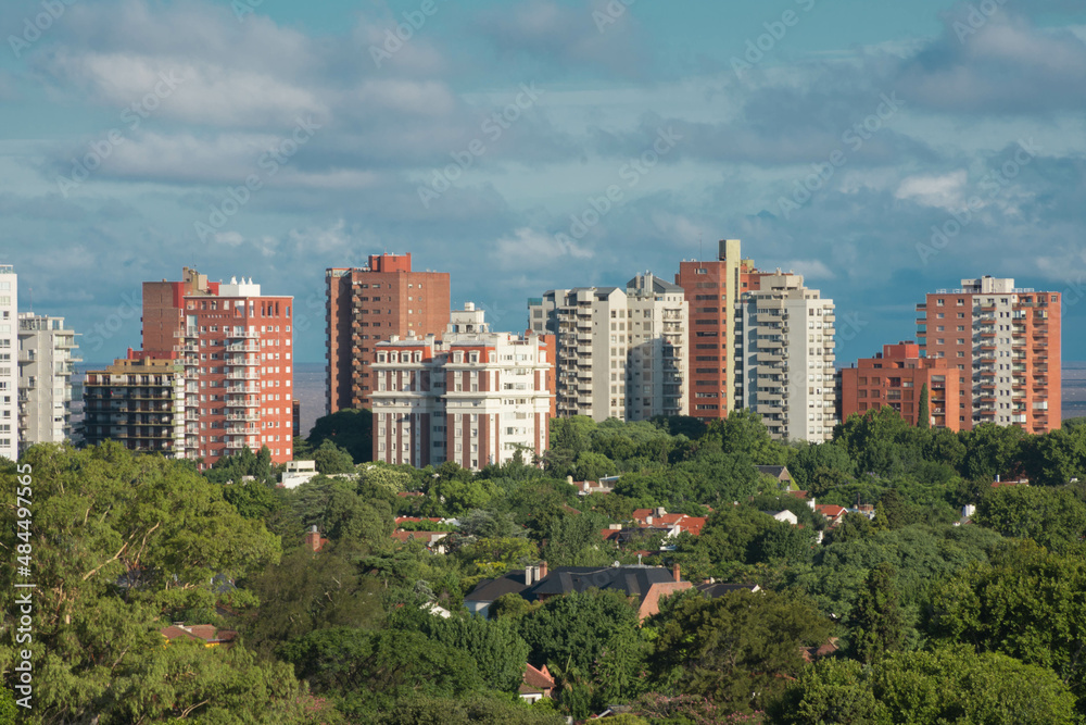 Green environment city , San Isidro neighborhood buildings, red brick towers, in wooded area