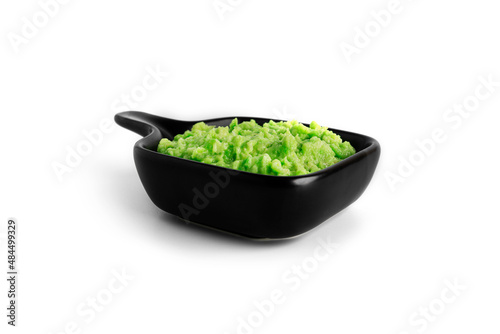 Guacamole sauce isolated on a white background.
