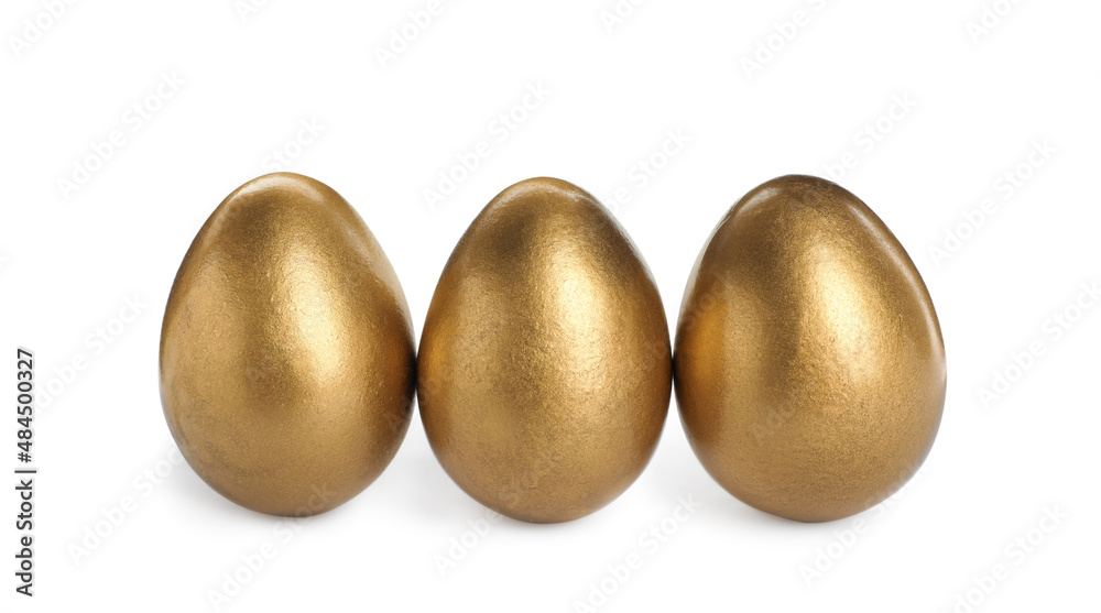 Many shiny golden eggs on white background Many shiny golden eggs on white background