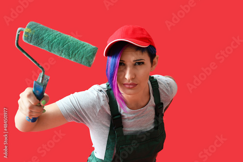 Female painter with roller ...