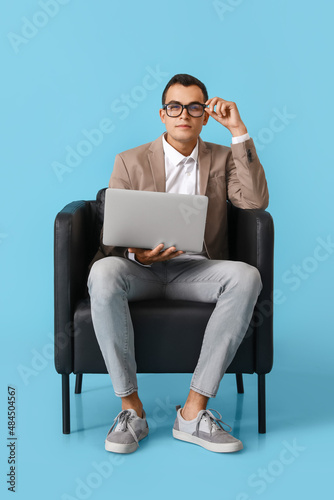 Young man with eyeglasses a...
