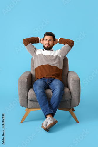 Handsome bearded man restin...