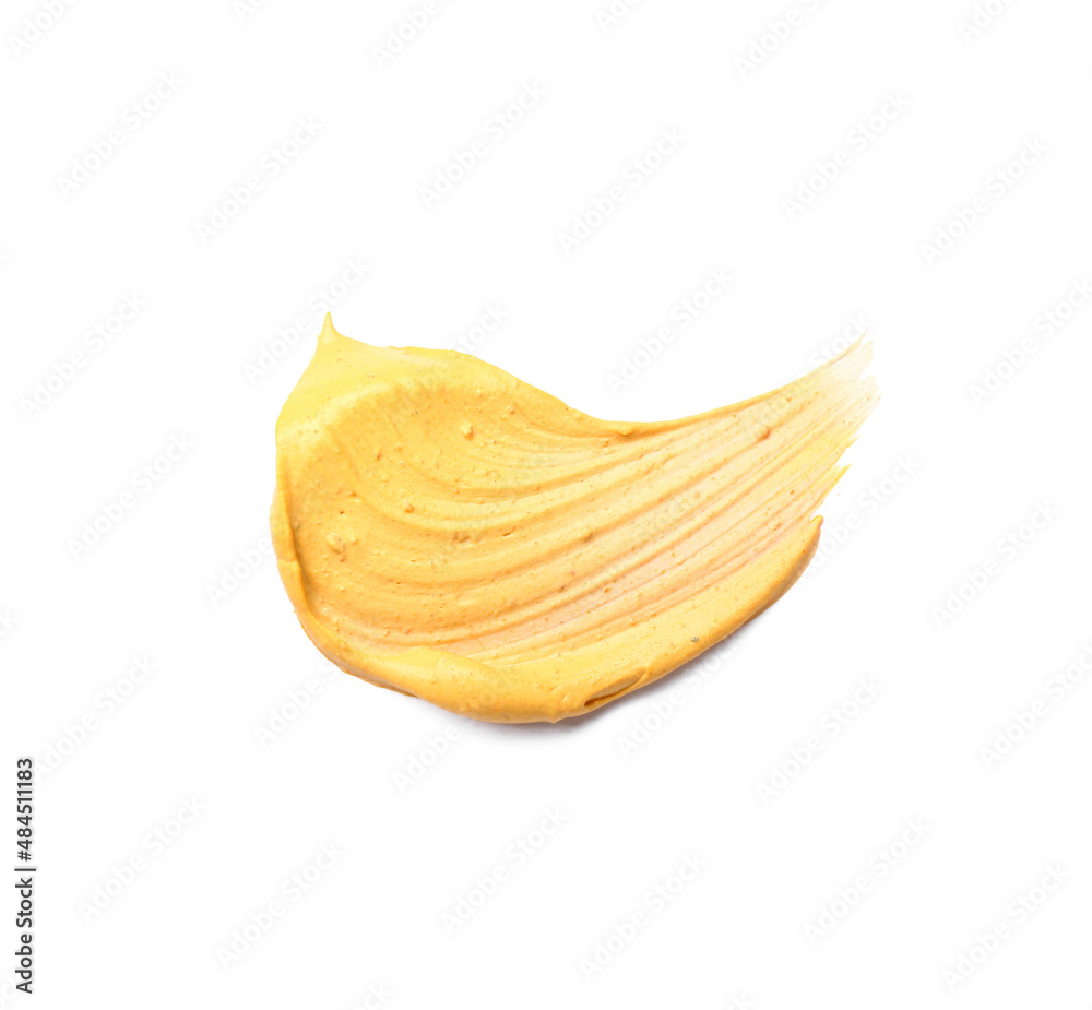 Smear of turmeric mask on white background Smear of turmeric mask on white background