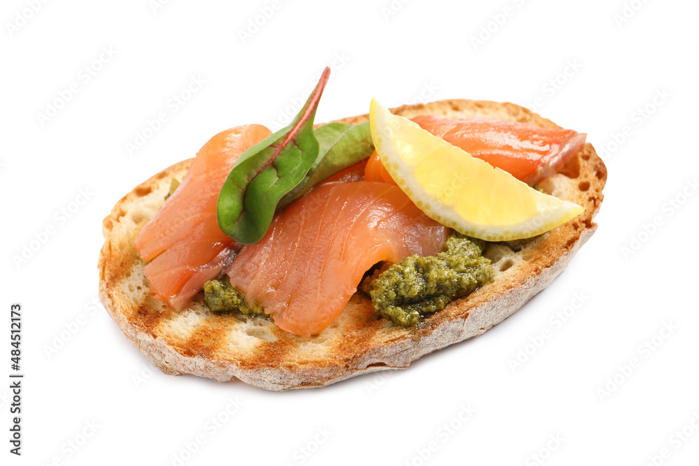 Delicious bruschetta with salmon and pesto sauce on white background