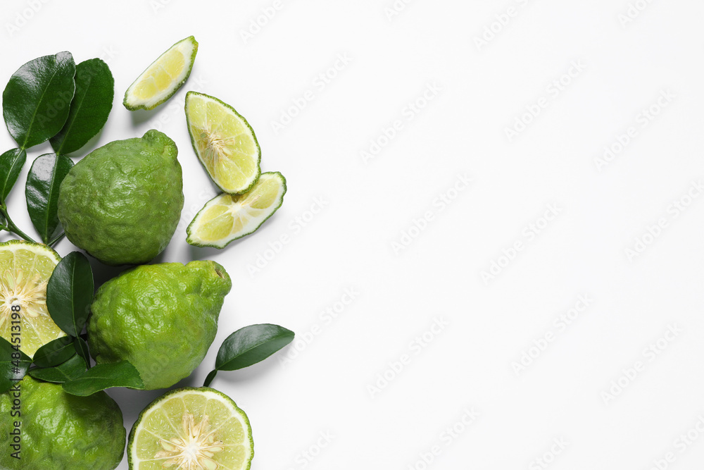 Flat lay composition with ripe bergamot fruits on white background. Space for text