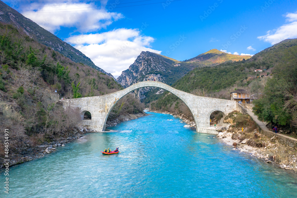 The great arched stone bridge of Plaka on Arachthos river, Tzoumerka