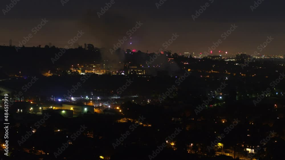Aerial Forward Shot Of Beautiful Fireworks In City At Night - Los Angeles, California Aerial Forward Shot Of Beautiful Fireworks In City At Night - Los Angeles, California