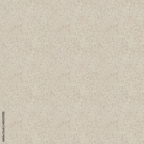 Seamless light brown spotted craft paper texture as background