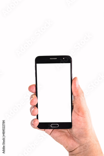 male hand holding cellphone black smartphone in horizontal position filming or photographing something , isolated white background, empty screen for mockup, copy space