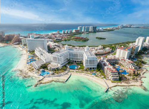 View of beautiful Hotels in the hotel zone of Cancun. Riviera Maya region in Quintana roo on Yucatan Peninsula. Aerial panoramic view of allinclusive resort photo