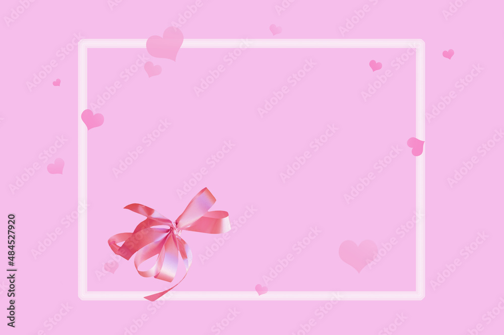 Bright beautiful pink background with a bow, hearts and place for text..on an abstract background with bokeh