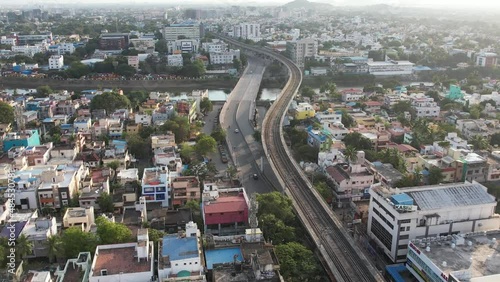 Aerial Footage of Cooum River Going Through Chennai City. The Cooum river is one of the shortest classified rivers draining into the Bay of Bengal. Metro Railway and Bridge build around the river.