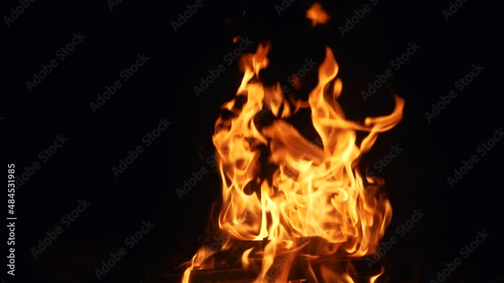 flames of fire on a black background in hell. hot fire burns hot. energy flammable concept. warm spark of fire fire hazard gasoline effect light flames of fire on a black background in hell. hot fire burns hot. energy flammable concept. warm spark of fire fire hazard gasoline effect light