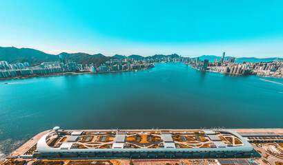 Keuken achterwand Turquoise Panoramic aerial view of Hong Kong city in Orange and Teal  color tone  © YiuCheung