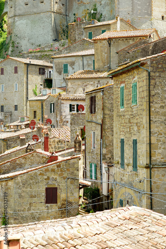 Rooftops of Sorano, an ancient medieval hill town hanging from a tuff stone over the Lente River. photo