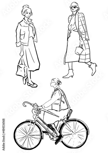出勤　トレンチコートを着た女性　Female in a trench coat　Woman riding a bicycle