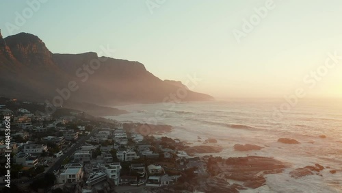 Scenic Beach And Houses At Table Mountain National Park, Cape Town During Sunset - aerial drone shot