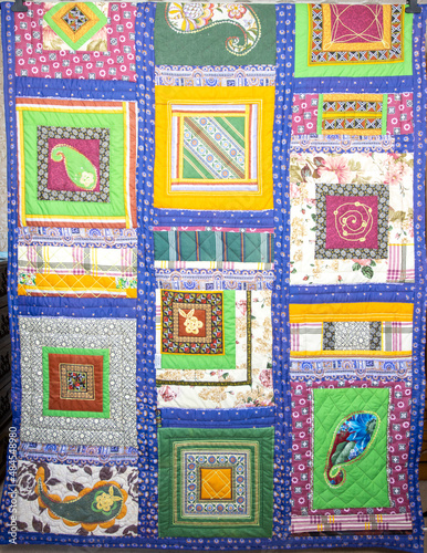Patchwork quilt handmade. Home creativity.