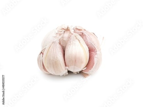 Spicy White Garlic Head with medicinal properties as herbs isolated on white background.
