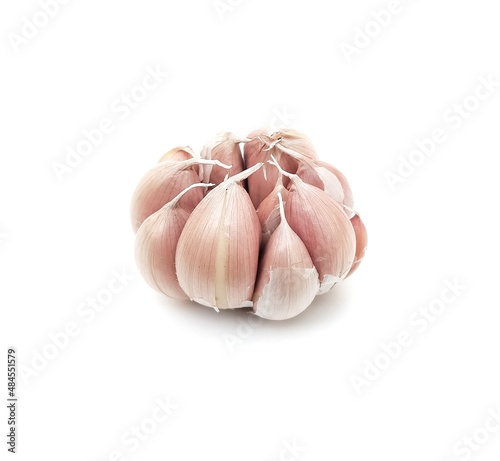 Spicy White Garlic Head with medicinal properties as herbs isolated on white background.