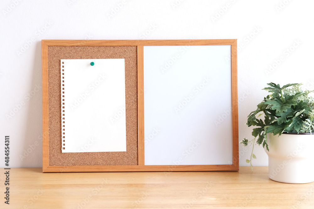 Blank notebook paper on white board background Blank notebook paper on white board background