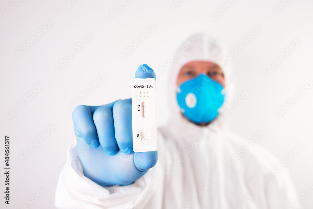Fototapeta premium Doctor with laboratory COVID-19 test kit for diagnosis coronavirus infection.
