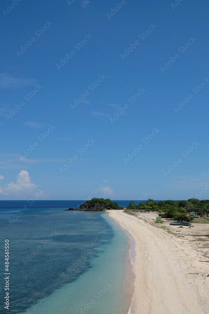 Beautiful scenery of One Dollar Beach located between Dili and Manatuto, Timor Leste. White sandy beach landscape.