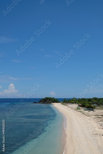 Fototapeta Naklejka Na Ścianę i Meble -  Beautiful scenery of One Dollar Beach located between Dili and Manatuto, Timor Leste. White sandy beach landscape.
