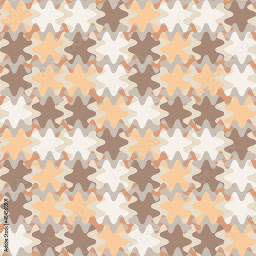 A seamless pattern on a square background is a patchwork mat made of different colored spots. Design element of books, notebooks, postcards, interior items. Wallpapers, textiles, packaging, background